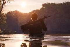 snake wading through a river in metal gear solid delta snake eater